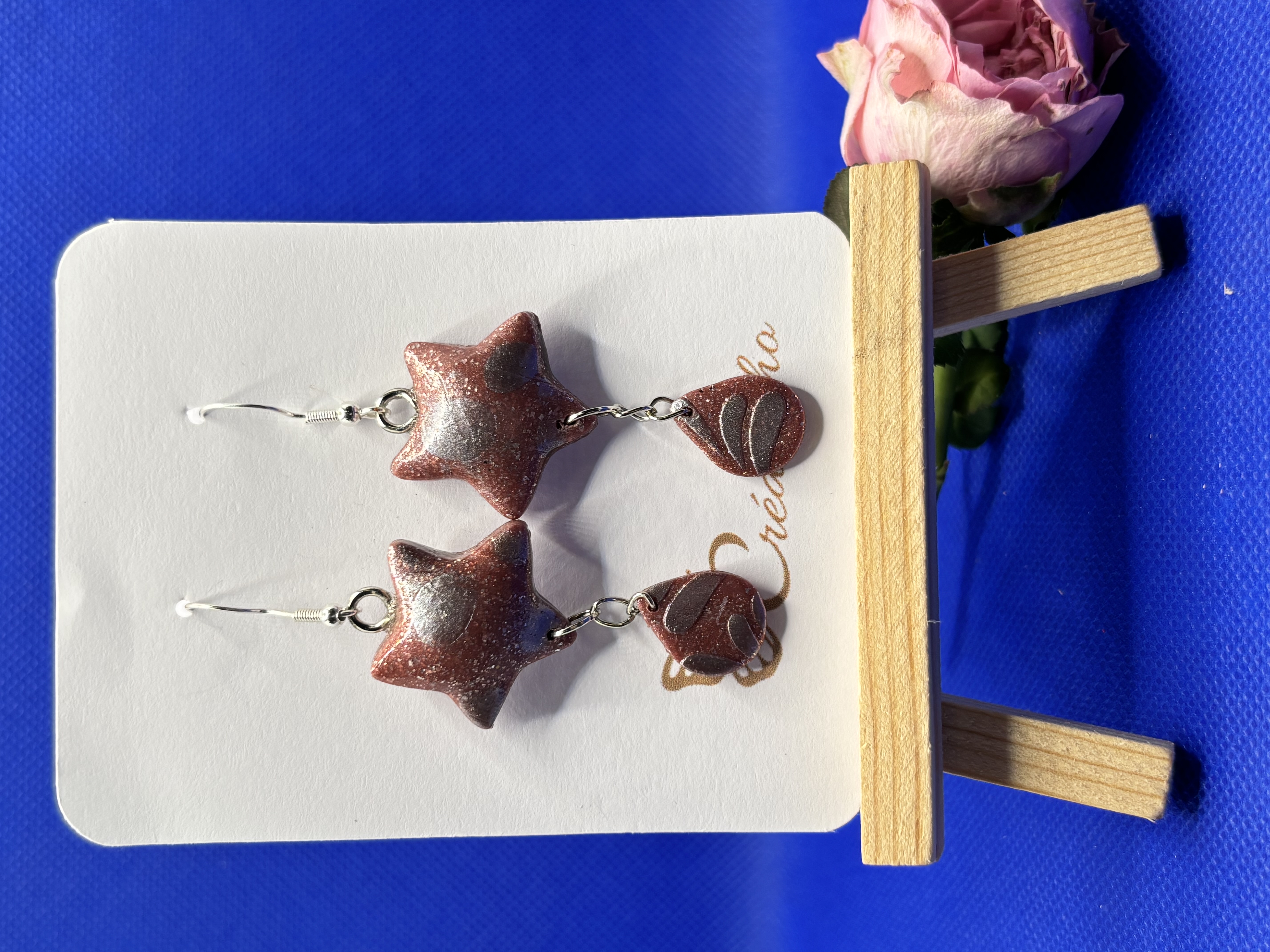 Boucle d'oreille étoile avec sa goutte APR5